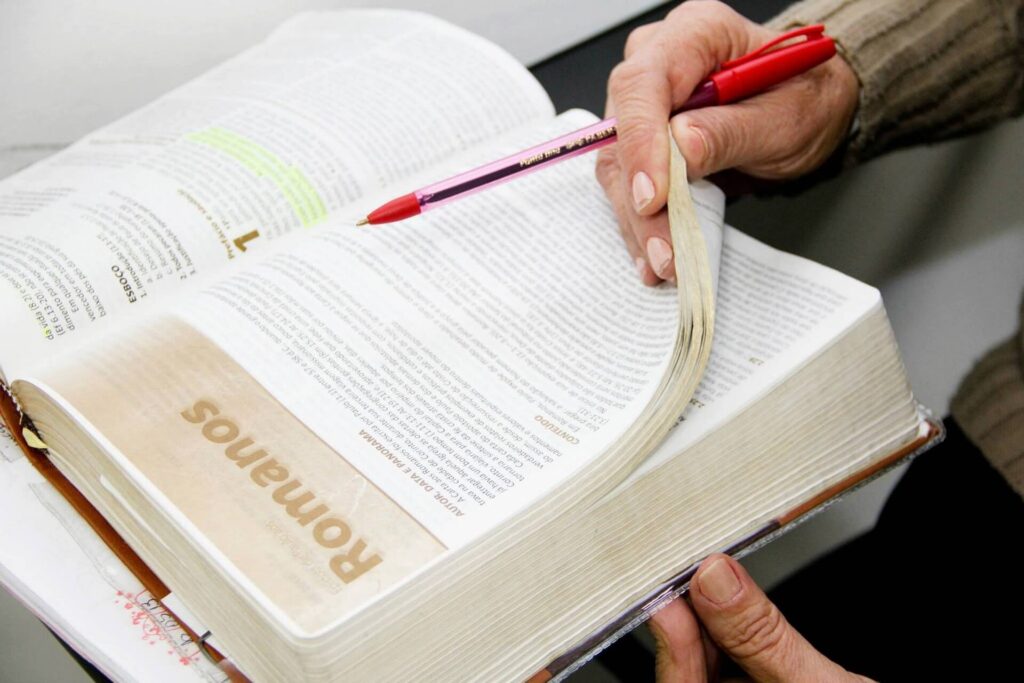 reading Bible with pen and highlighter